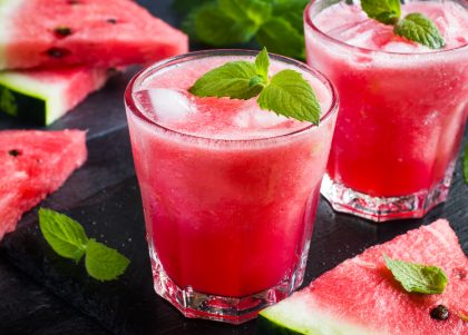 refreshing watermelon cocktail with ice and mint, selective focus